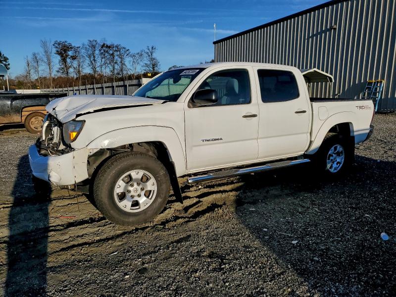 TOYOTA TACOMA DOU 2010 with VIN 5TEJU4GN0AZ697012 - Photo from auction