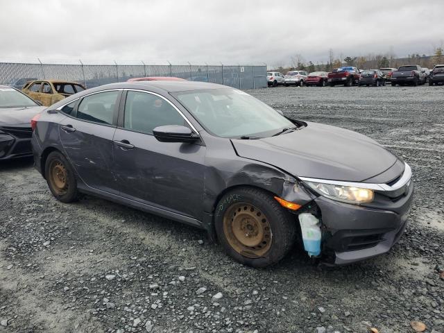 Photo 4 from auction – 2018 HONDA CIVIC LX with VIN 2HGFC2F58JH025520