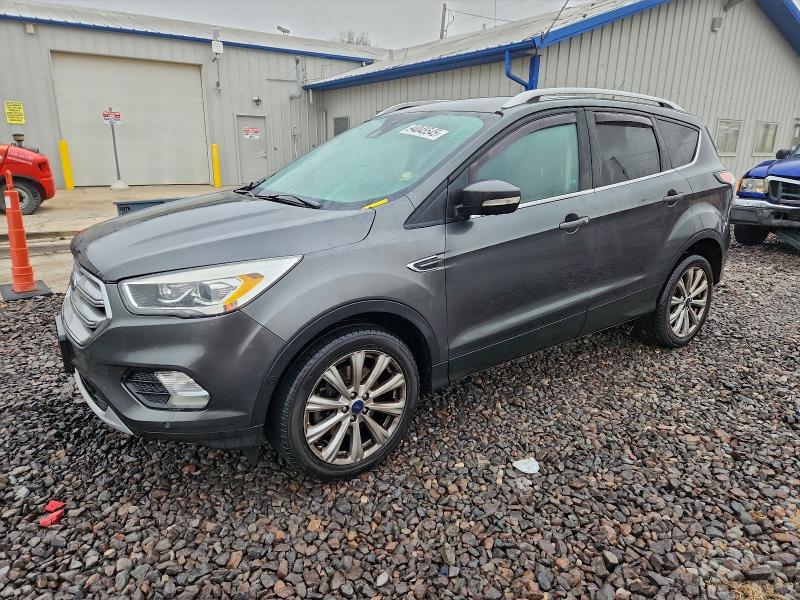 FORD ESCAPE TIT 2017 with VIN 1FMCU0J98HUA22178 - Photo from auction