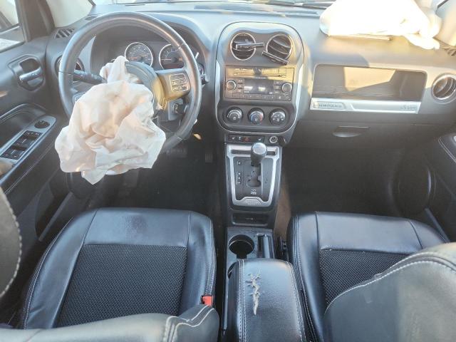 Photo 8 from auction – 2014 JEEP COMPASS LA with VIN 1C4NJCEA3ED630861