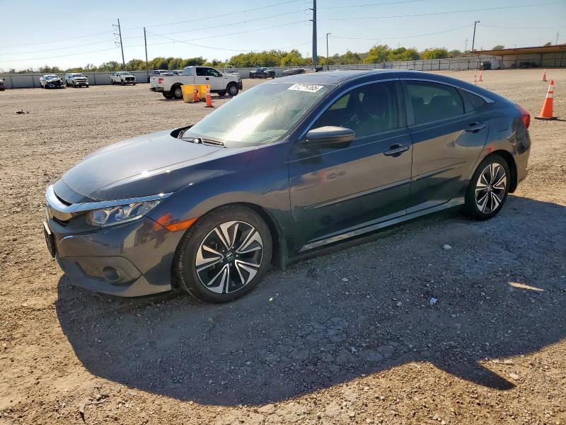 HONDA CIVIC EX 2018 with VIN JHMFC1F82JX008757 - Photo from auction