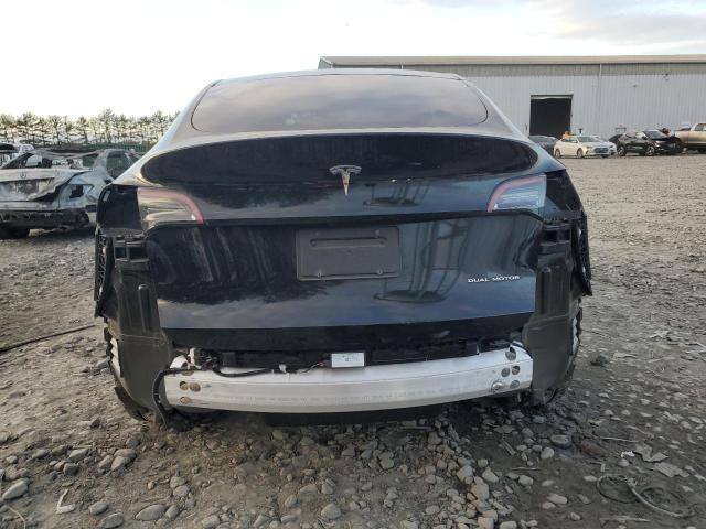 Photo 6 from auction – 2023 TESLA MODEL Y with VIN 7SAYGDEE1PA072380