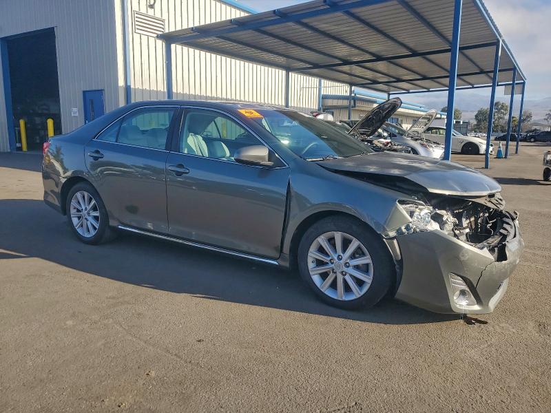 Photo 4 from auction – 2012 TOYOTA CAMRY HYBR with VIN 4T1BD1FK0CU055231