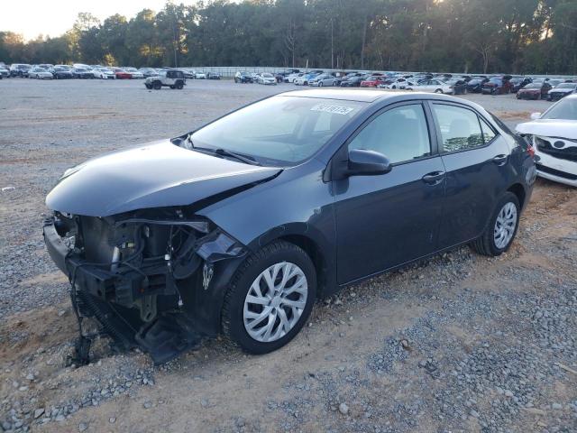 TOYOTA COROLLA L 2018 with VIN 5YFBURHE0JP827554 - Photo from auction