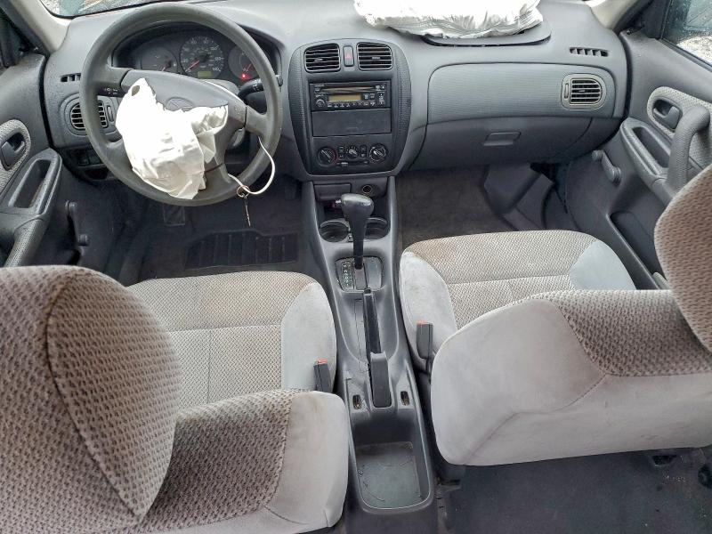 Photo 8 from auction – 1999 MAZDA PROTEGE ES with VIN JM1BJ2220X0106460