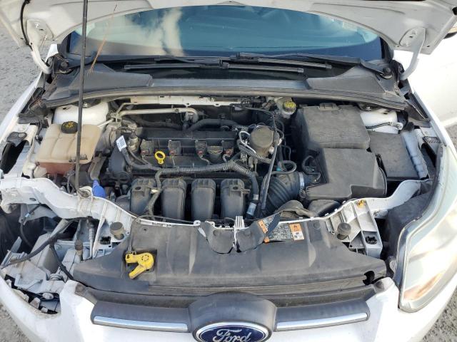 Photo 11 from auction – 2014 FORD FOCUS SE with VIN 1FADP3F21EL324402