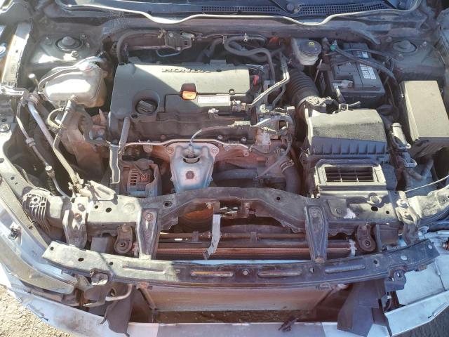 Photo 11 from auction – 2018 HONDA CIVIC LX with VIN 2HGFC2F64JH028410