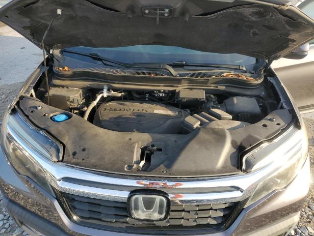 Photo 11 from auction – 2019 HONDA RIDGELINE with VIN 5FPYK3F71KB004878