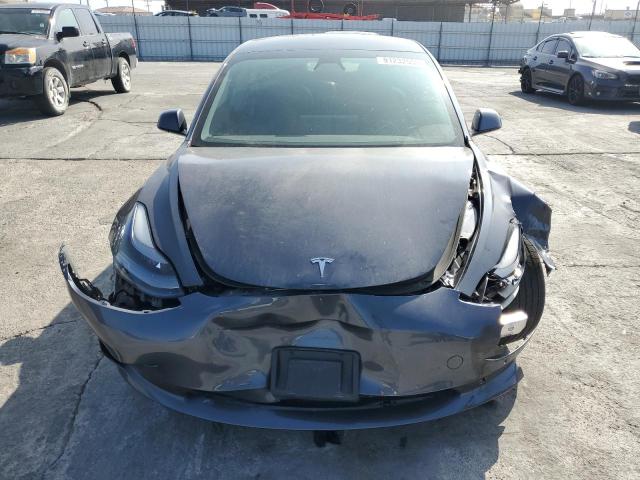 Photo 5 from auction – 2021 TESLA MODEL 3 with VIN 5YJ3E1EB7MF938468