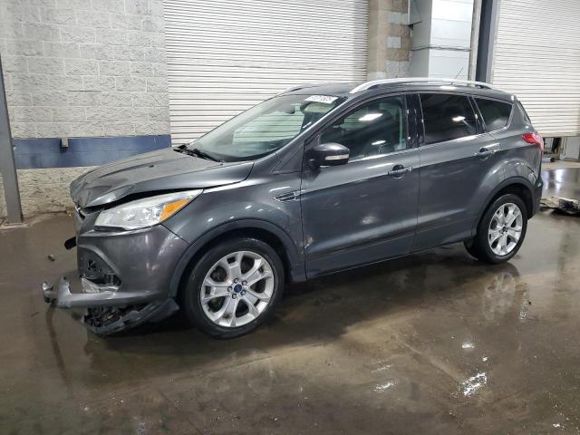 FORD ESCAPE TIT 2016 with VIN 1FMCU9JX4GUB87338 - Photo from auction