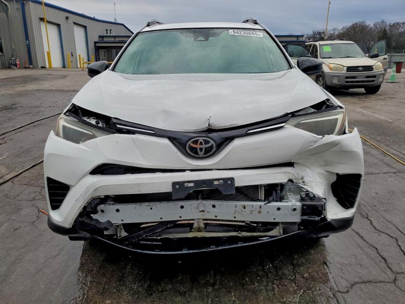 Photo 5 from auction – 2017 TOYOTA RAV4 LE with VIN 2T3BFREV1HW567664