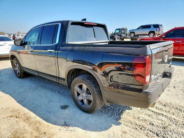 Photo 2 from auction – 2023 HONDA RIDGELINE with VIN 5FPYK3F77PB065787
