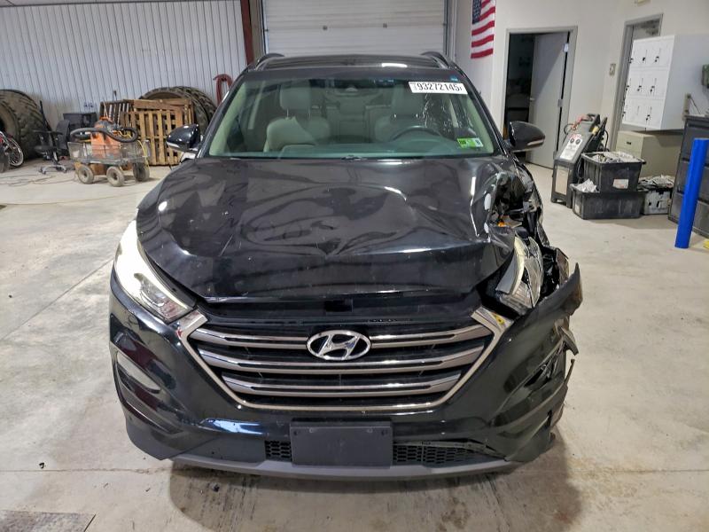 Photo 5 from auction – 2016 HYUNDAI TUCSON LIM with VIN KM8J33A21GU214345