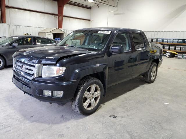 HONDA RIDGELINE 2009 with VIN 5FPYK16509B099995 - Photo from auction