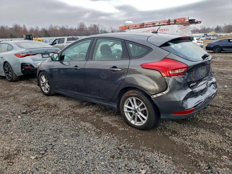 Photo 2 from auction – 2015 FORD FOCUS SE with VIN 1FADP3K2XFL370379