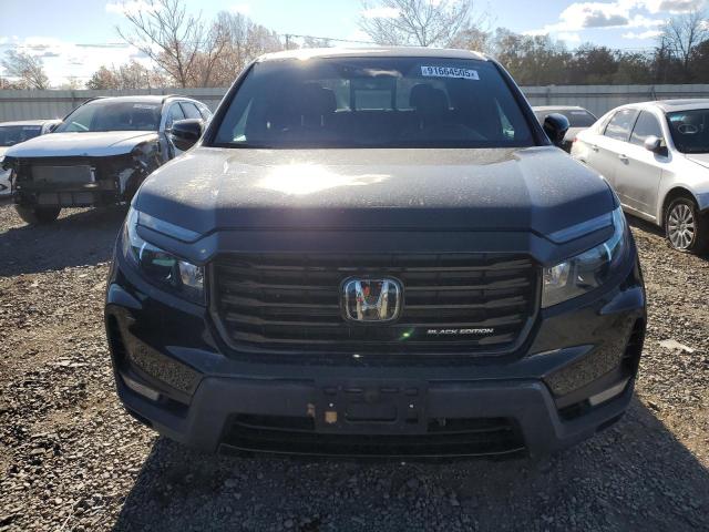Photo 5 from auction – 2023 HONDA RIDGELINE with VIN 5FPYK3F8XPB055814