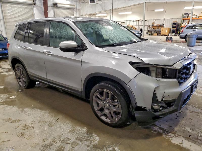 Photo 4 from auction – 2022 HONDA PASSPORT E with VIN 5FNYF8H5XNB008664