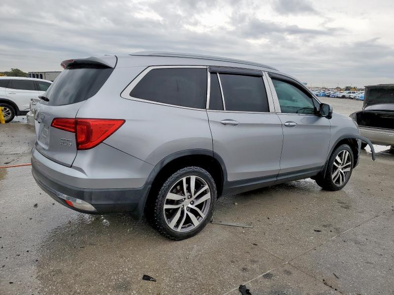 Photo 3 from auction – 2016 HONDA PILOT TOUR with VIN 5FNYF6H90GB075395