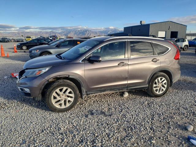 HONDA CR-V EX 2015 with VIN 3CZRM3H59FG705357 - Photo from auction