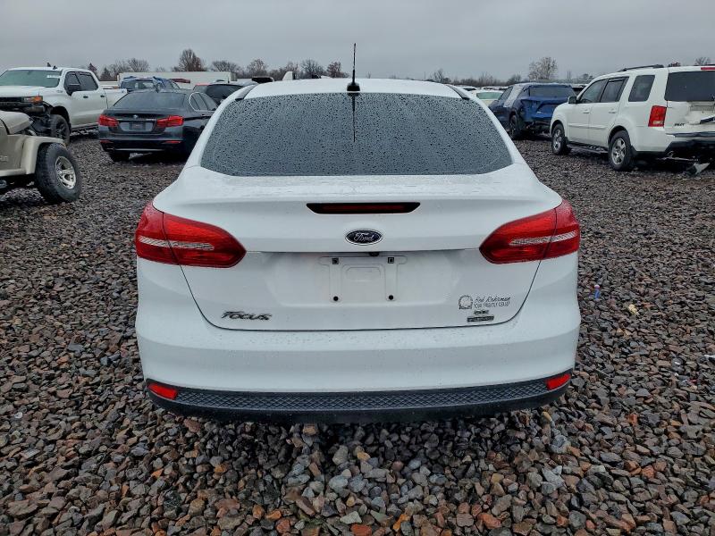 Foto 6 de la subasta – 2018 FORD FOCUS SE con VIN 1FADP3FE8JL301462
