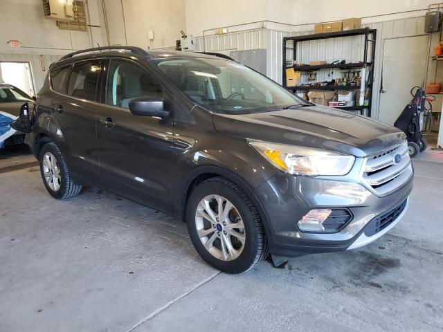 Photo 4 from auction – 2018 FORD ESCAPE SE with VIN 1FMCU0GD0JUA41017