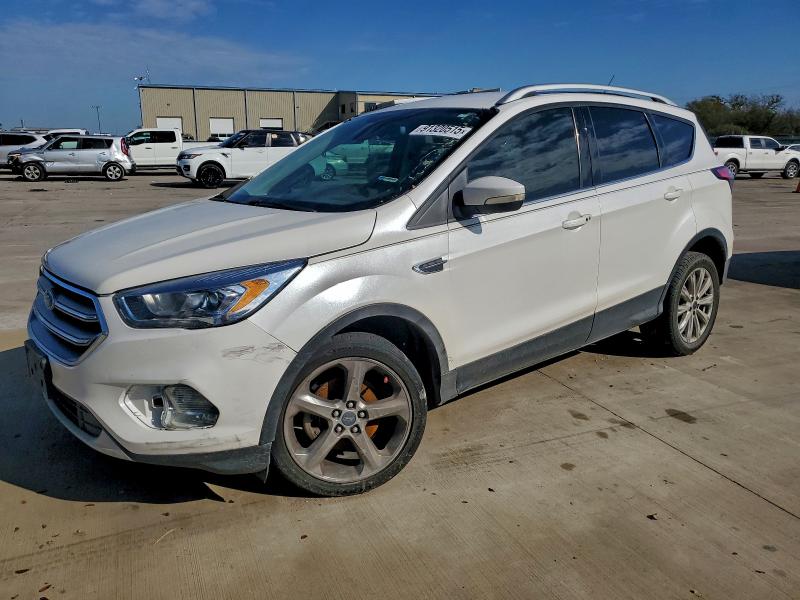 FORD ESCAPE TIT 2017 with VIN 1FMCU0JD8HUE07230 - Photo from auction
