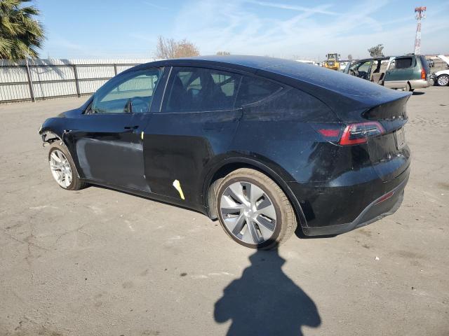 Photo 2 from auction – 2022 TESLA MODEL Y with VIN 7SAYGAEE1NF514878