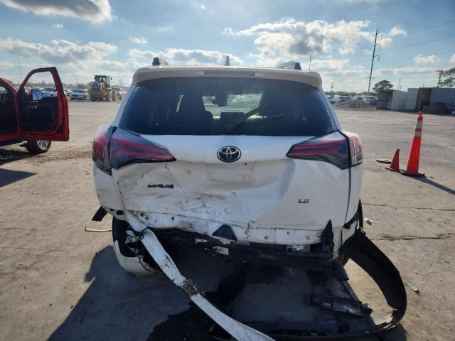 Photo 6 from auction – 2018 TOYOTA RAV4 LE with VIN JTMZFREV1JD130961