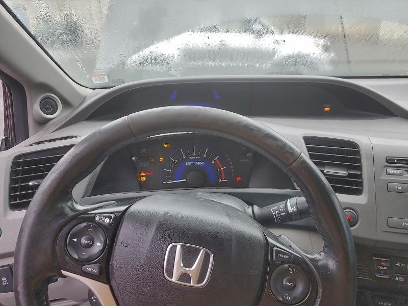 Photo 9 from auction – 2012 HONDA CIVIC HYBR with VIN JHMFB4F31CS006300