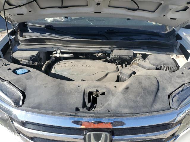 Photo 12 from auction – 2016 HONDA PILOT TOUR with VIN 5FNYF6H93GB076606