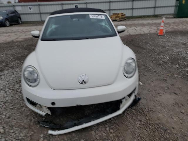 Photo 5 from auction – 2013 VOLKSWAGEN BEETLE with VIN 3VW5P7AT9DM810620