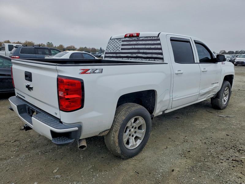 Photo 3 from auction – 2018 CHEVROLET SILVERADO with VIN 3GCUKREC8JG590450
