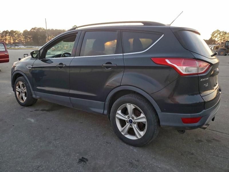 Photo 2 from auction – 2015 FORD ESCAPE SE with VIN 1FMCU9G90FUC66688