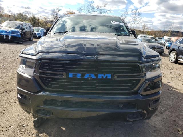 Photo 5 from auction – 2021 RAM 1500 LARAM with VIN 1C6SRFJT4MN624393