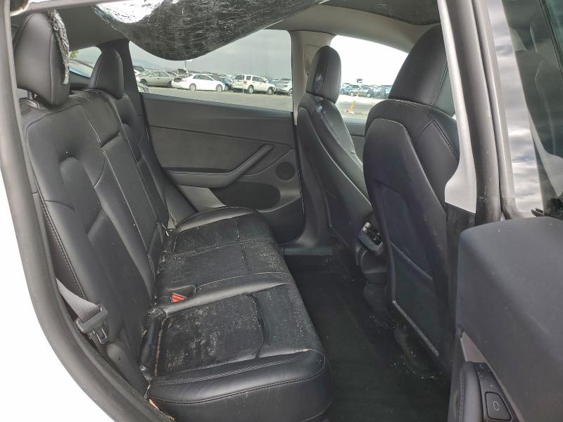 Photo 11 from auction – 2022 TESLA MODEL Y with VIN 7SAYGDEE1NF571499
