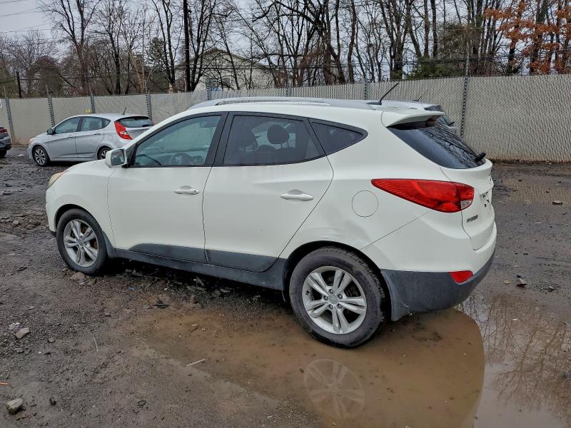 Photo 2 from auction – 2010 HYUNDAI TUCSON with VIN KM8JUCAC6AU080462