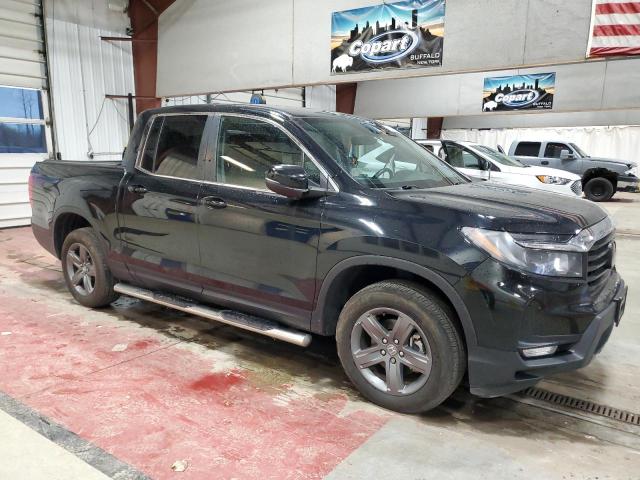 Photo 4 from auction – 2022 HONDA RIDGELINE with VIN 5FPYK3F50NB026888
