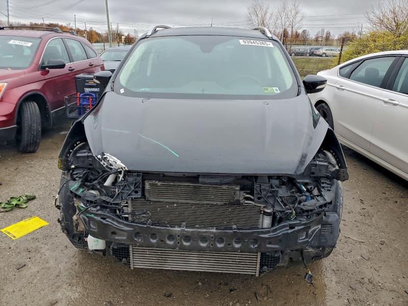 Photo 5 from auction – 2018 FORD ESCAPE TIT with VIN 1FMCU0J97JUC94890