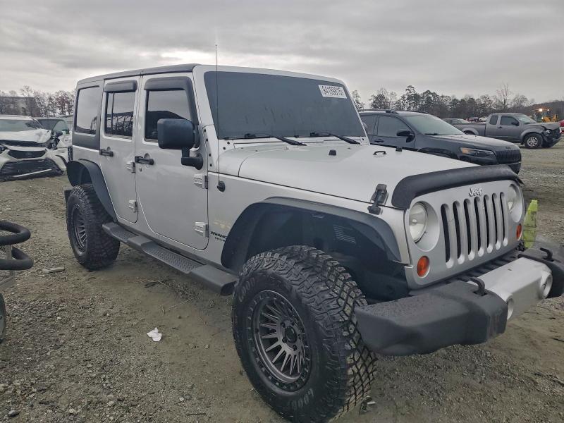 Photo 4 from auction – 2011 JEEP WRANGLER U with VIN 1J4BA5H15BL505124
