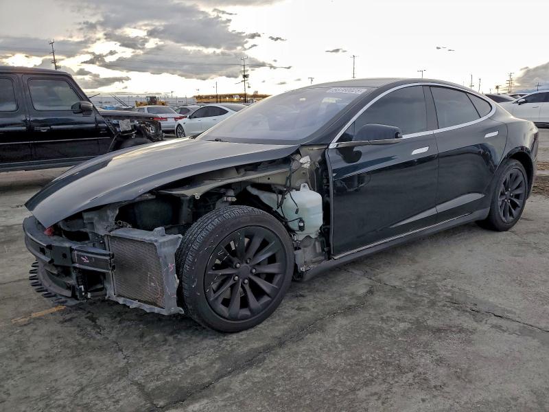 TESLA MODEL S 2014 with VIN 5YJSA1H14EFP45013 - Photo from auction
