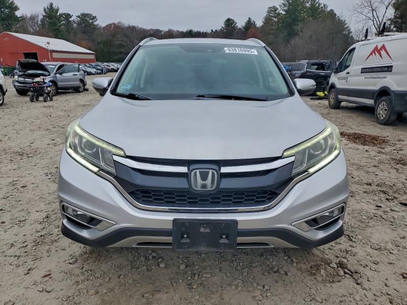 Photo 5 from auction – 2015 HONDA CR-V TOURI with VIN 5J6RM4H91FL120901