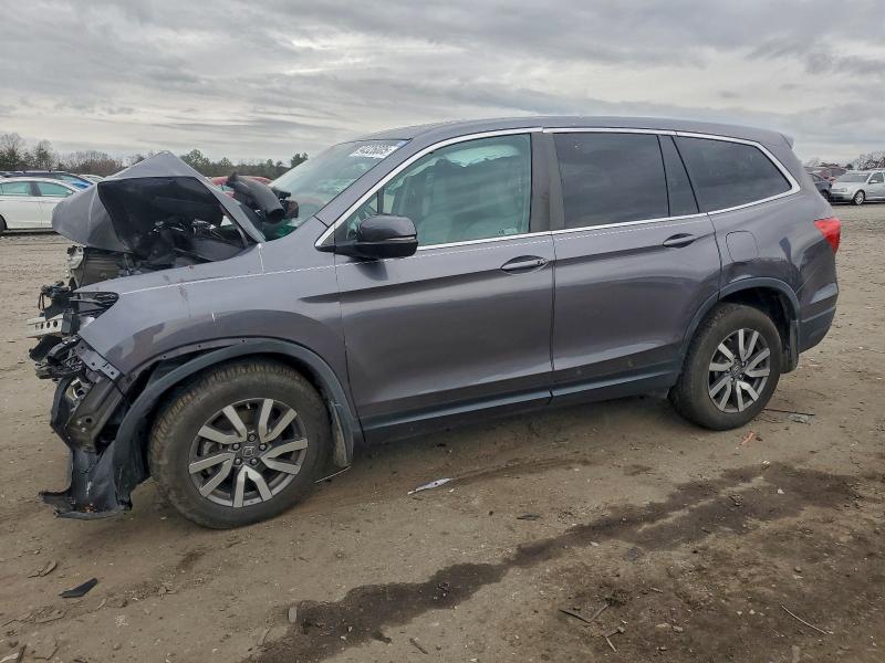 HONDA PILOT EXL 2021 with VIN 5FNYF6H58MB058952 - Photo from auction