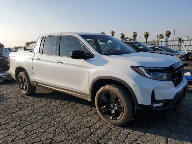 Photo 4 from auction – 2025 HONDA RIDGELINE with VIN 5FPYK3F87SB005400