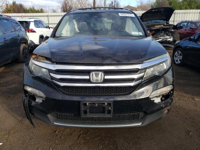 Photo 5 from auction – 2016 HONDA PILOT TOUR with VIN 5FNYF6H94GB097187