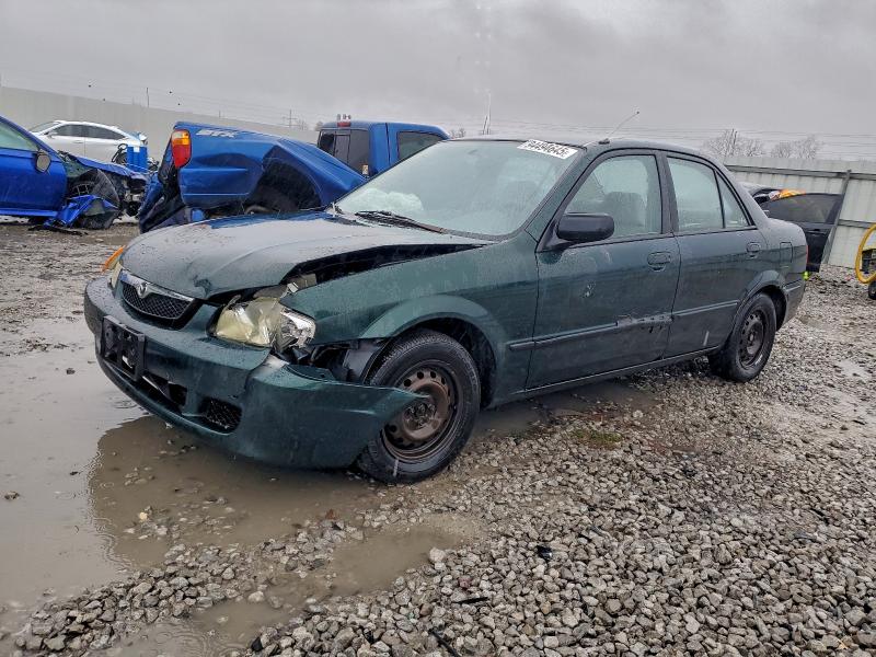 MAZDA PROTEGE ES 1999 with VIN JM1BJ2220X0106460 - Photo from auction