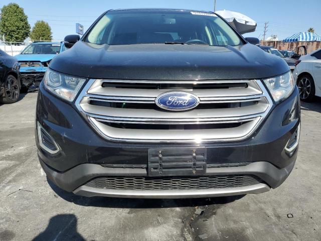 Photo 5 from auction – 2015 FORD EDGE TITAN with VIN 2FMTK3K96FBC07628