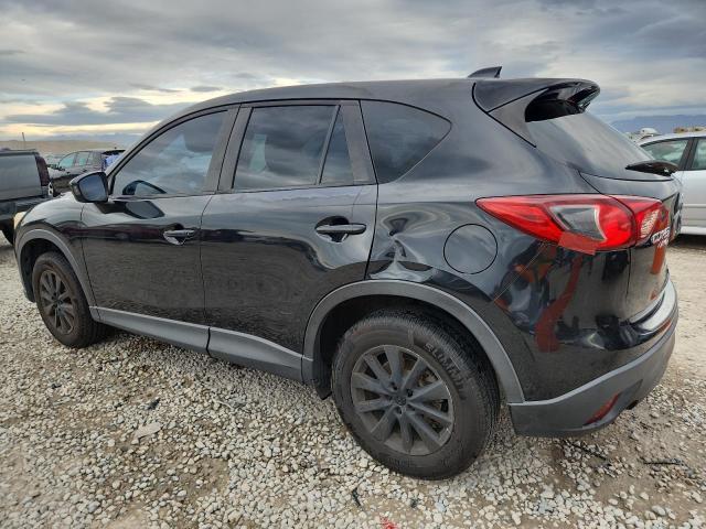 Photo 2 from auction – 2013 MAZDA CX-5 TOURI with VIN JM3KE4CE4D0124424