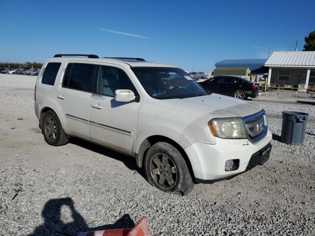 Фото 4 с аукциона – 2011 HONDA PILOT TOUR с VIN 5FNYF4H94BB036693