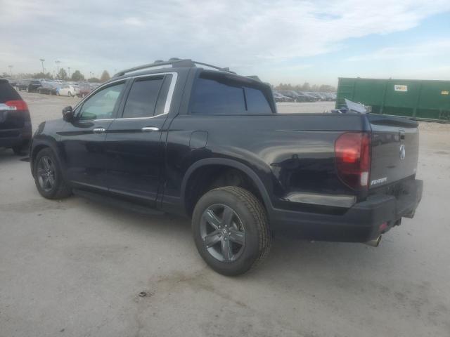 Photo 2 from auction – 2023 HONDA RIDGELINE with VIN 5FPYK3F74PB032049