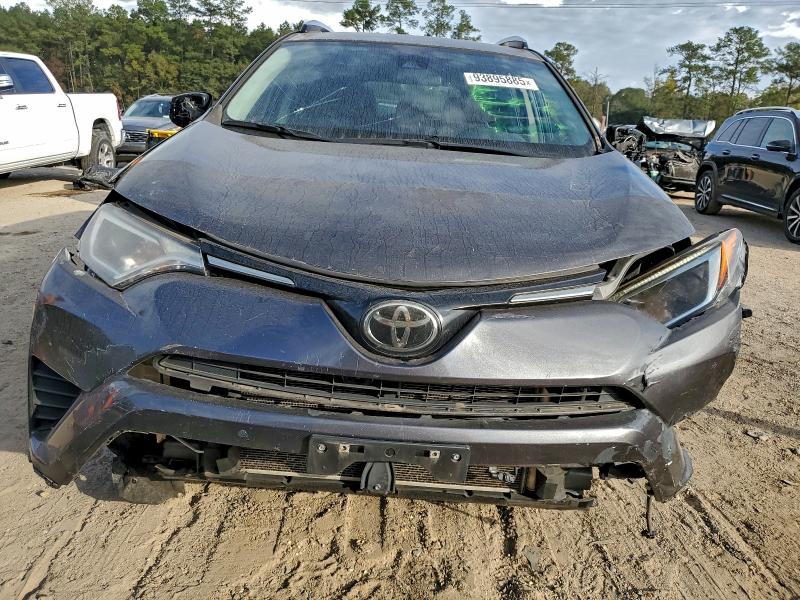 Photo 5 from auction – 2017 TOYOTA RAV4 with VIN JTMZFREV8HJ147994